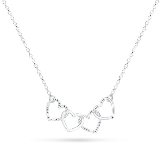 A silver Cariad necklace by Elin Mair featuring three interlocking open heart pendants on a delicate chain, shown against a plain white background.