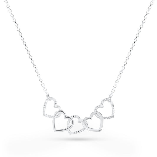 A silver Cariad necklace by Elin Mair featuring three interlocking open heart pendants, some outlined with small pavé-set stones, on a delicate link chain against a white background.